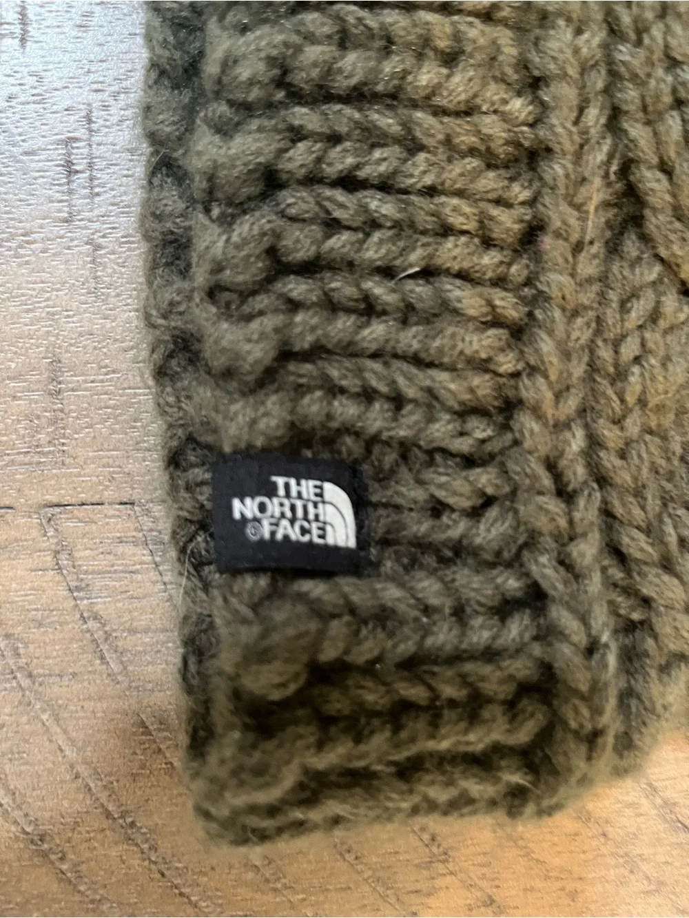 The North Face Olive Cable Knit Beanie with Faux Fur Pom